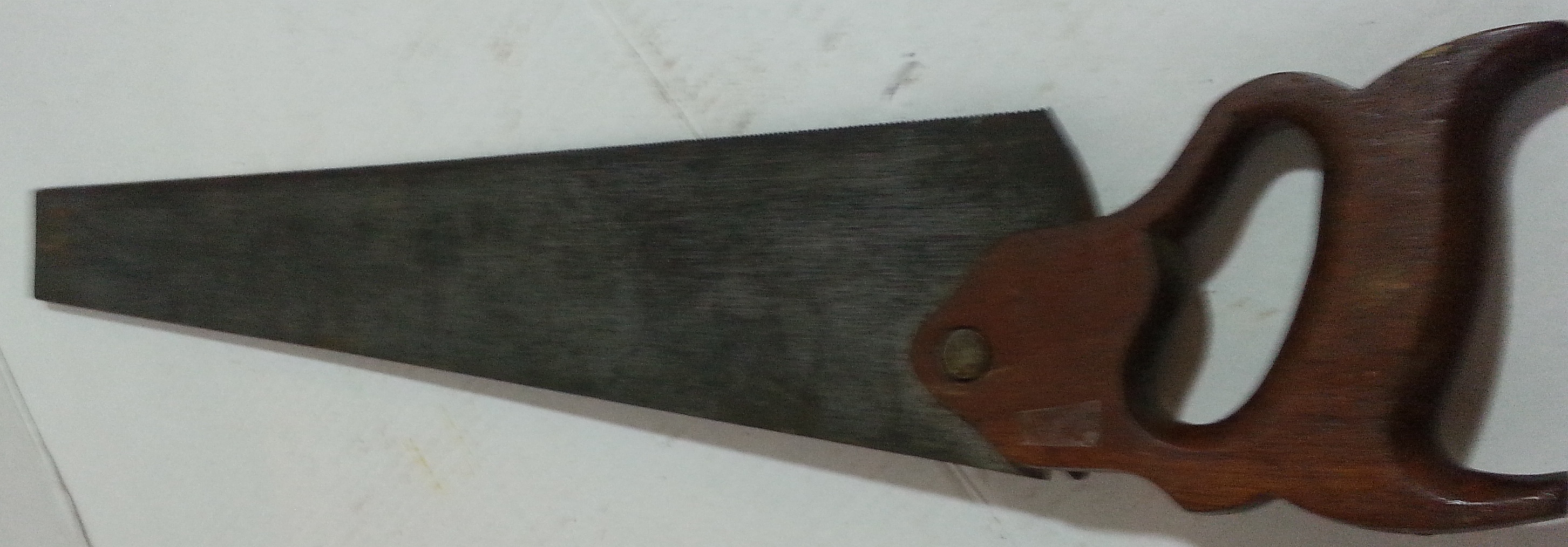 antique saw with blade changing latch